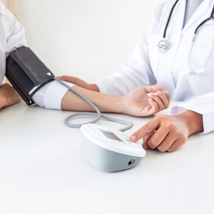 Doctor consulting patient
